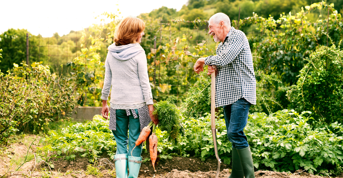 Man And Women laughing in allotment